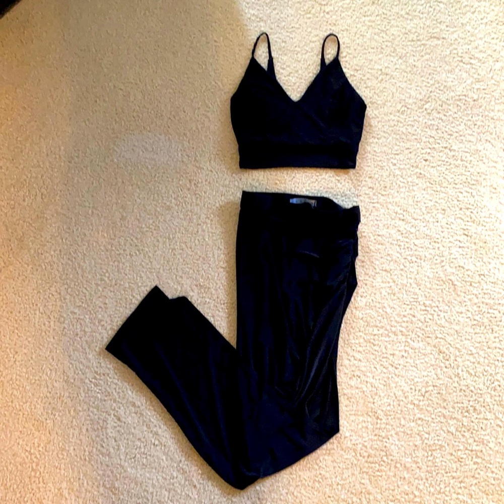Black skirt/crop top set.